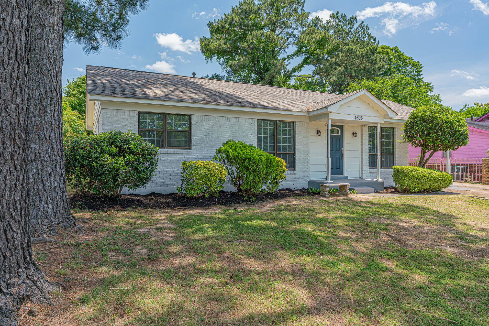 4606 Tulane Road Memphis, TN 38109 - Photo 2 of 25 a front view of a house with garden