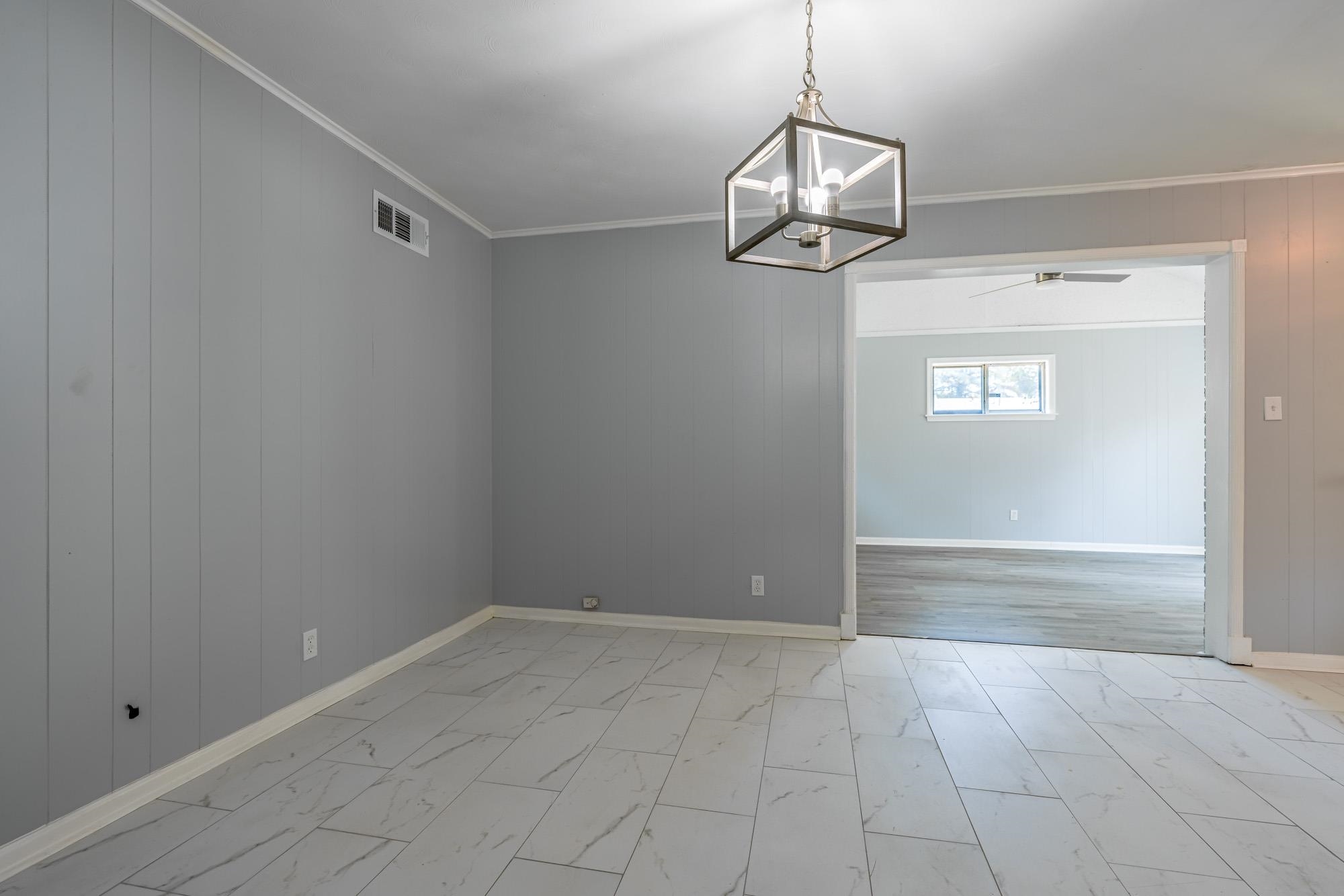 4606 Tulane Road Memphis, TN 38109 - Photo 9 of 25 a view of an empty room with a window