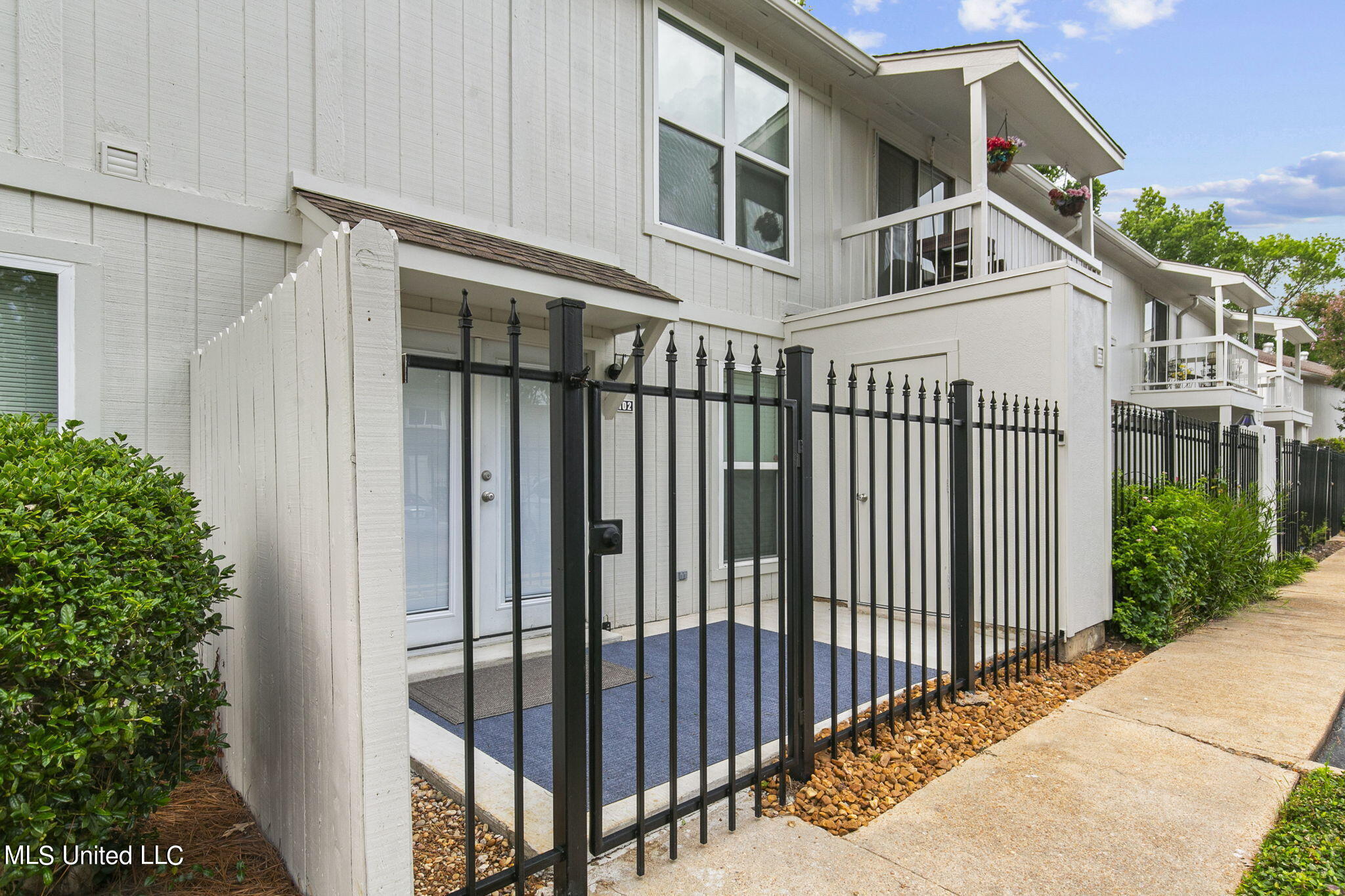 Large back porch with some water views
