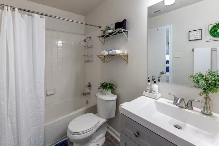 2304 Smith Branch Boulevard, Unit A Georgetown, TX 78626 - Photo 15 of 26 a bathroom with a sink toilet and shower