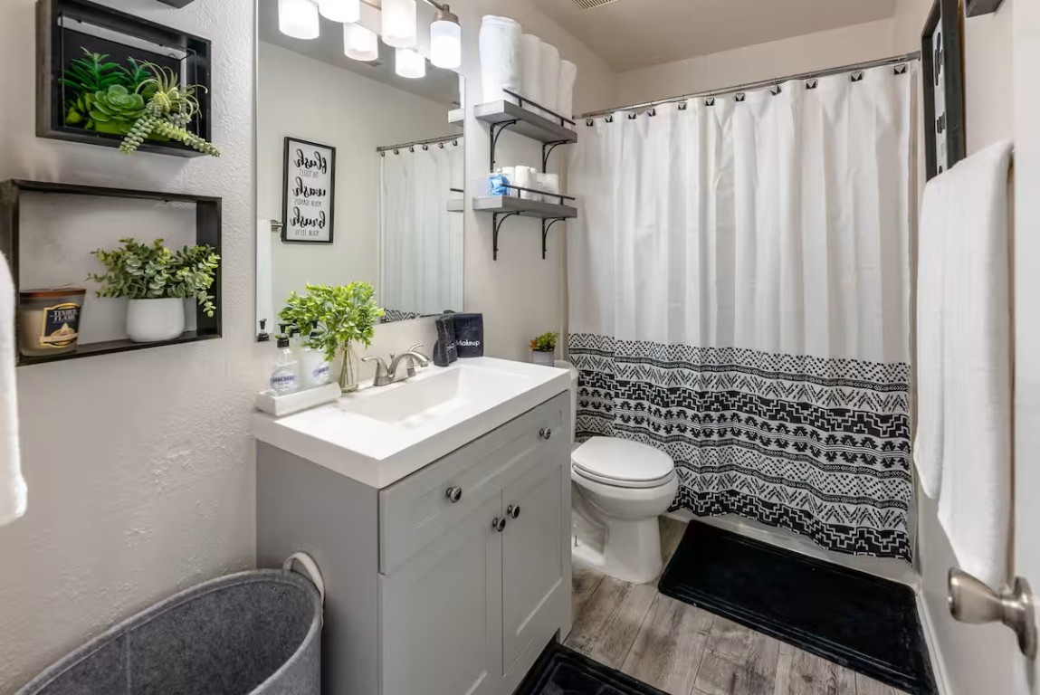 2304 Smith Branch Boulevard, Unit A Georgetown, TX 78626 - Photo 20 of 26 a bathroom with a sink toilet and shower