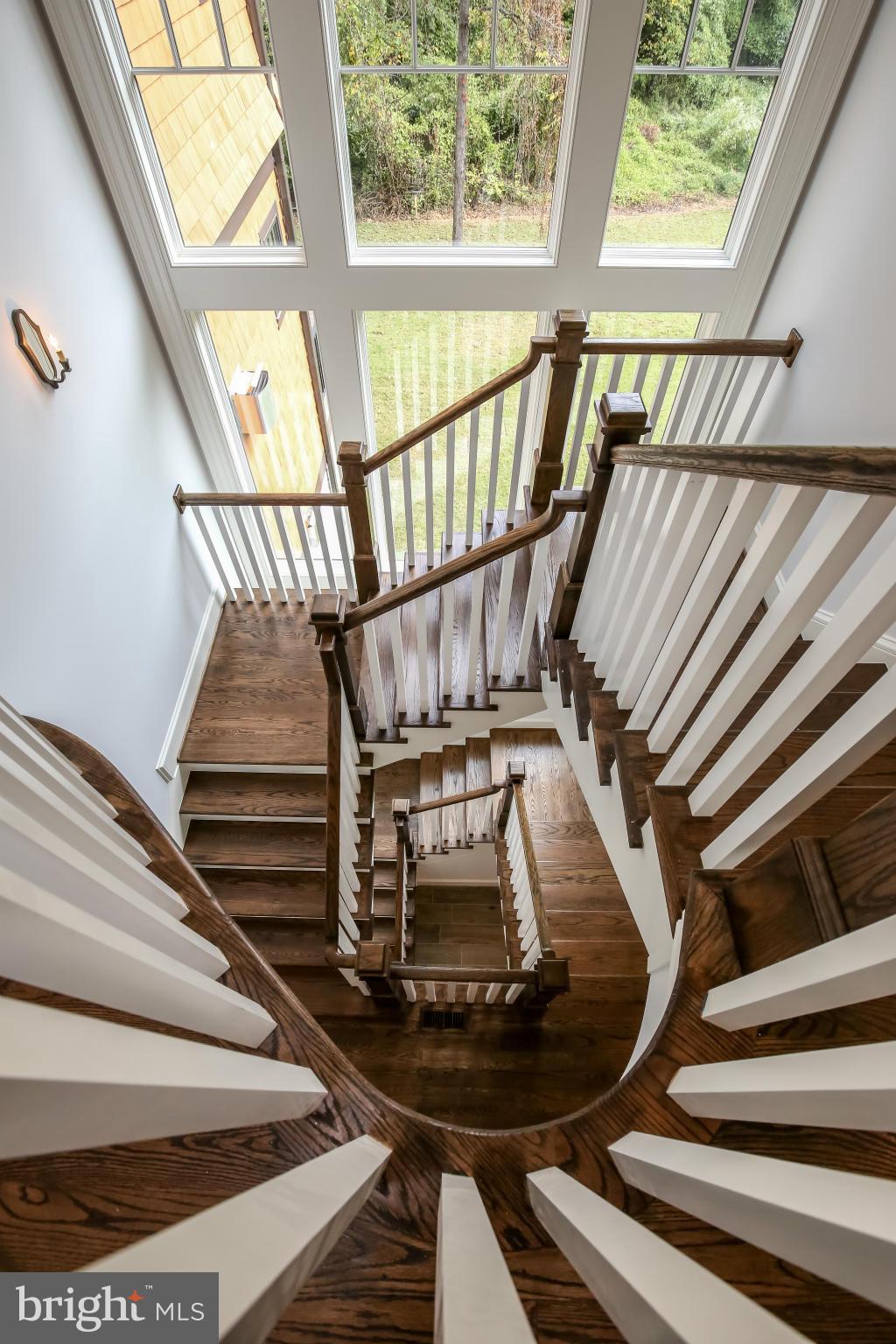 8701 Burning Tree Road Bethesda, MD 20817 - Photo 13 of 29 Main Stairway from Upper Level
