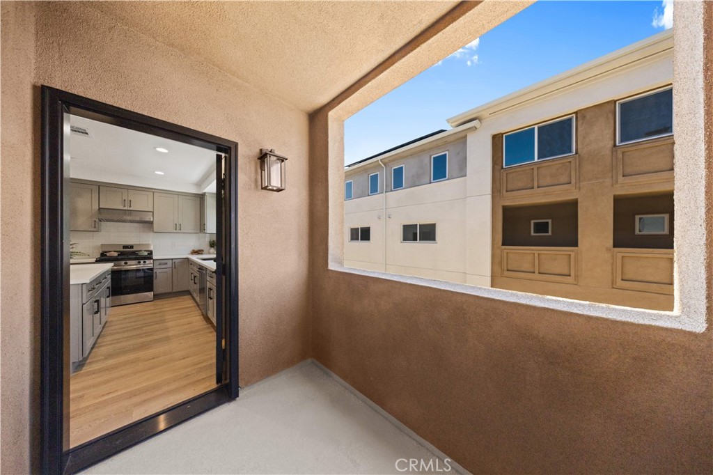 7692 9th Street, Unit 113 Buena Park, CA 90621 - Photo 29 of 41 a view of a living room with a large window