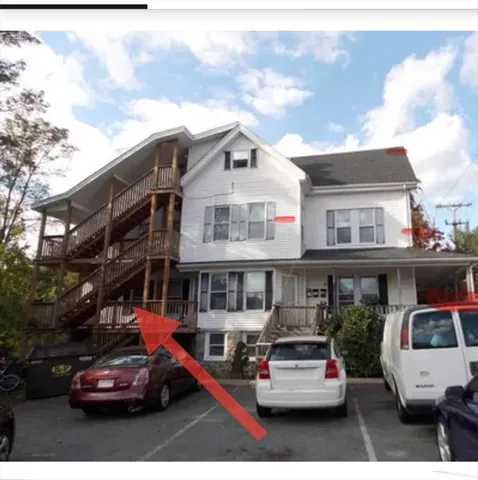 a car parked in front of a building