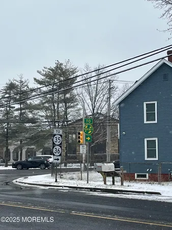 a front view of a house with parking space