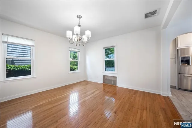 a view of livingroom with hardwood floor and window