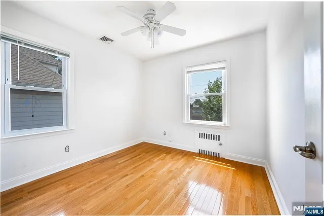 a view of a bedroom with a window