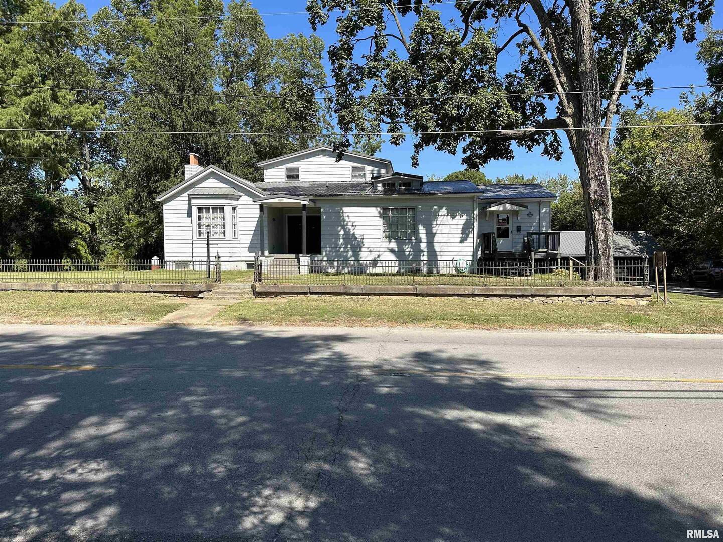 a view of a house with a swimming pool