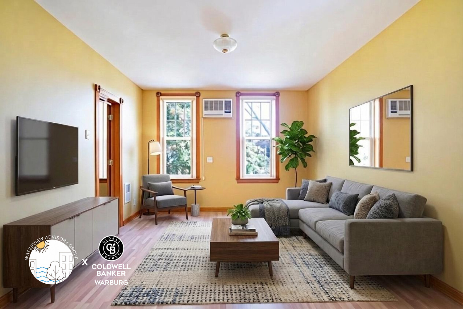 a living room with furniture and a flat screen tv