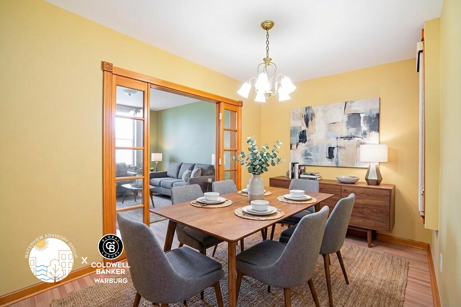 71-20 68th Street, Unit 2 Queens, NY 11385 - Photo 3 of 9 a view of a dining room with furniture and chandelier