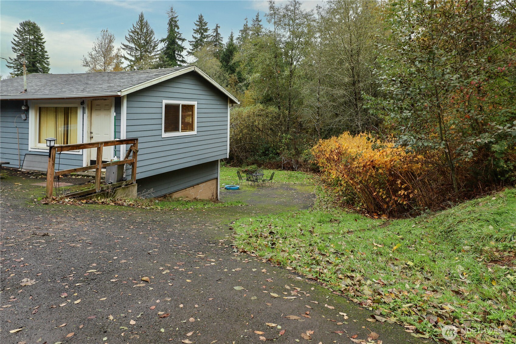 6703 Karjala Road Aberdeen, WA 98520 - Photo 15 of 15 a view of a house with a yard
