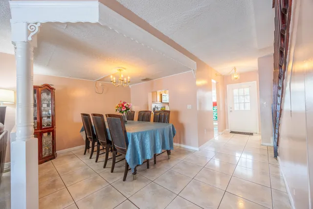 a view of a dining room with furniture