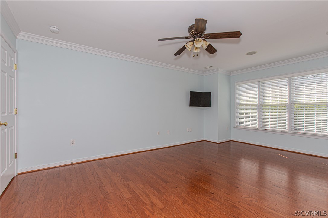 5056 Park Commons Loop Glen Allen, VA 23059 - Photo 14 of 29 wooden floor in an empty room with a window