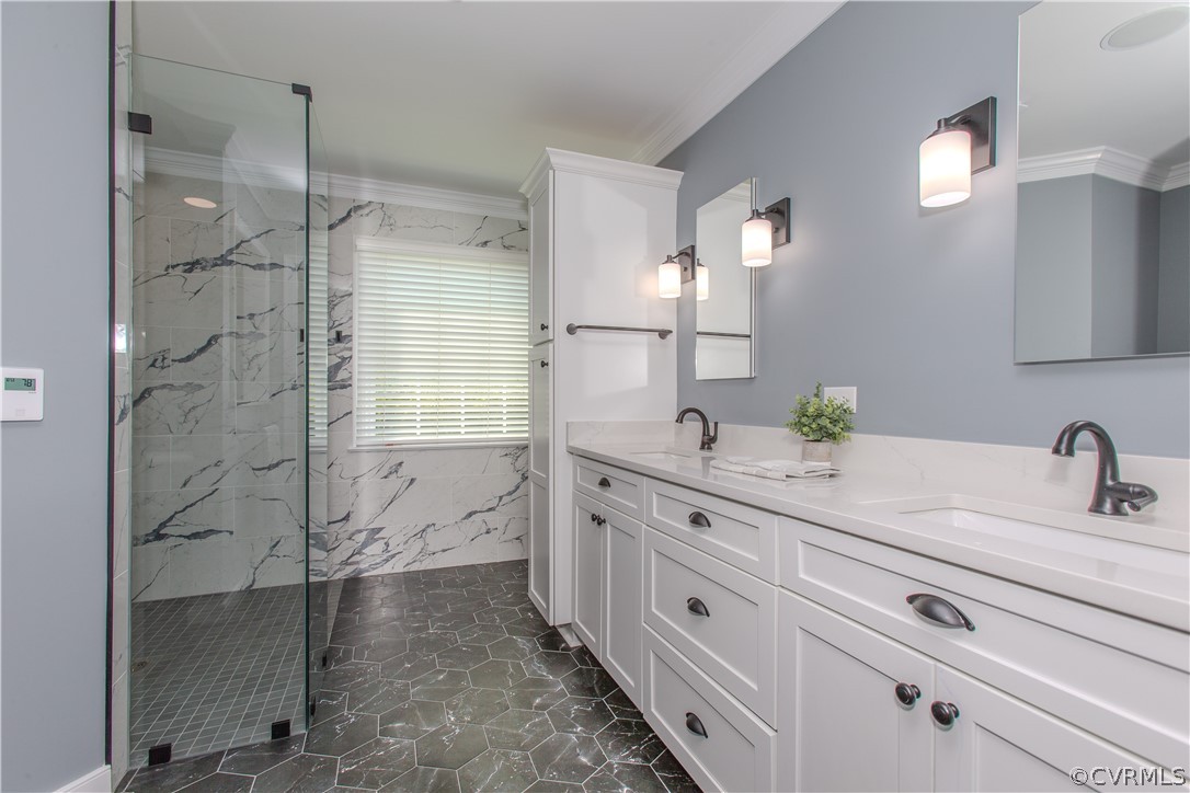 5056 Park Commons Loop Glen Allen, VA 23059 - Photo 16 of 29 a bathroom with a shower sink and mirror