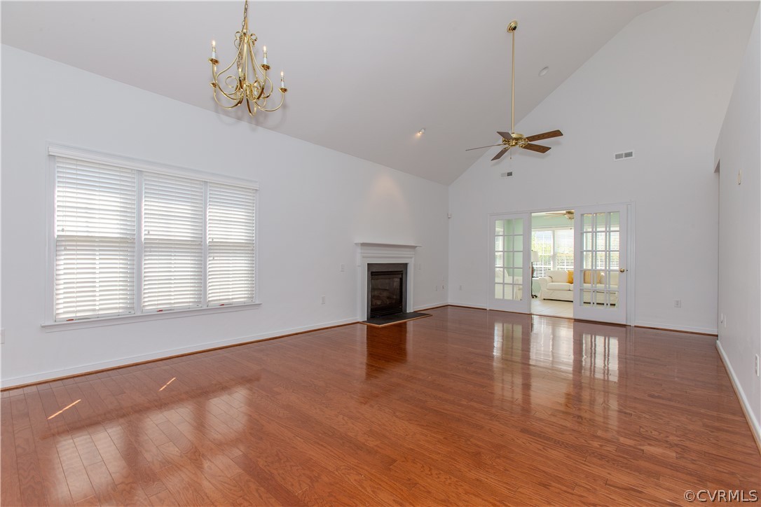 5056 Park Commons Loop Glen Allen, VA 23059 - Photo 5 of 29 a view of an empty room with a window and wooden floor