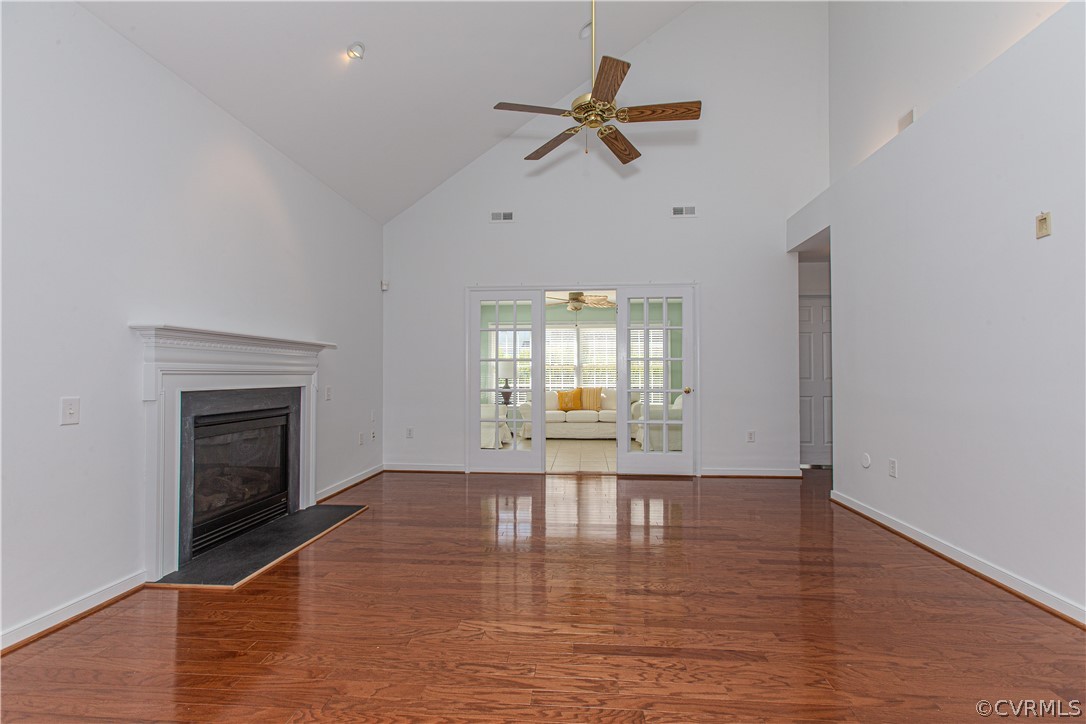 5056 Park Commons Loop Glen Allen, VA 23059 - Photo 6 of 29 a view of empty room with wooden floor and fireplace