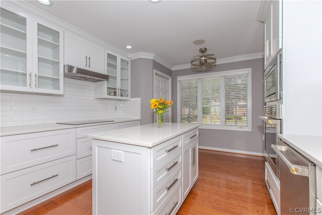 5056 Park Commons Loop Glen Allen, VA 23059 - Photo 9 of 29 a kitchen with a stove and a sink