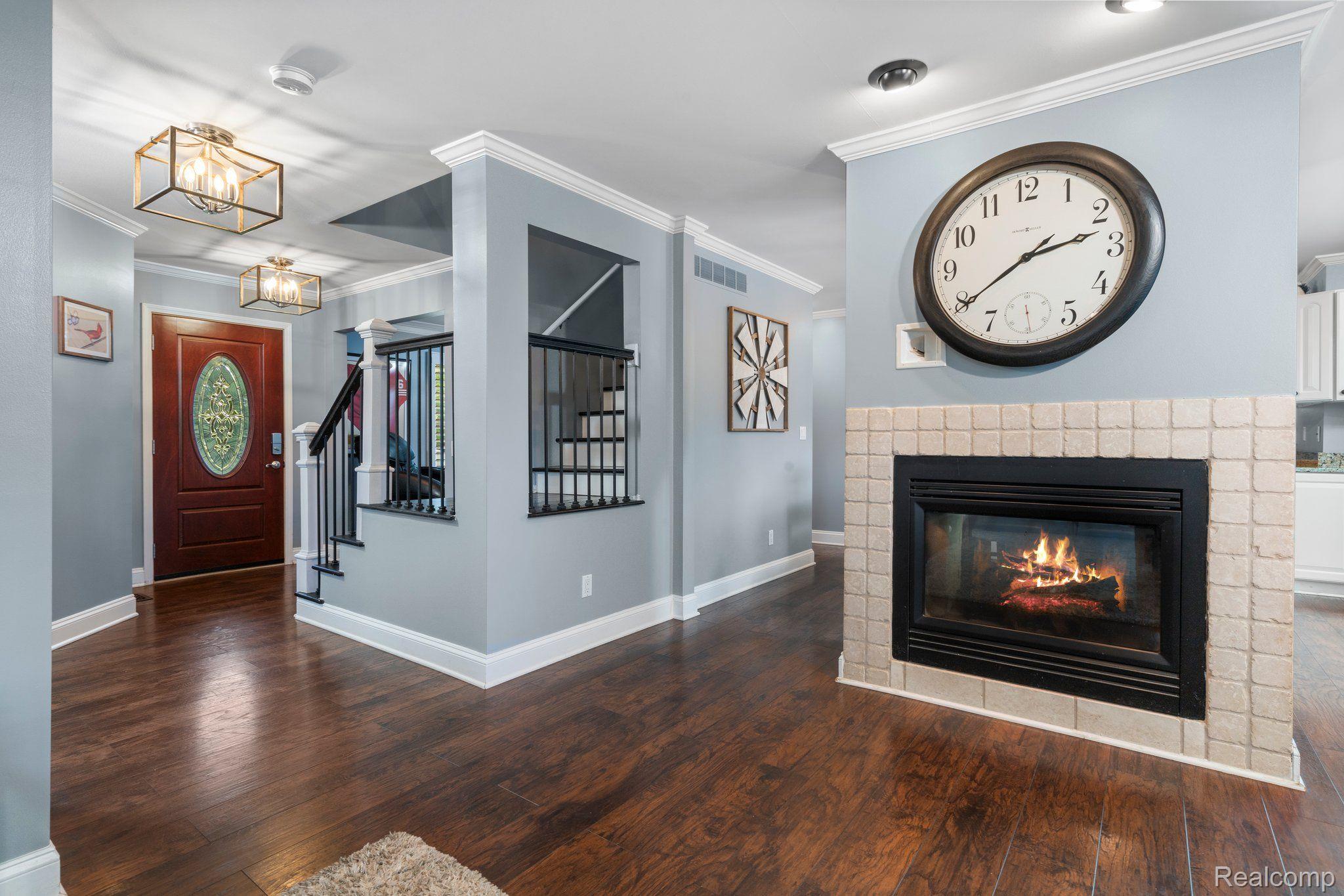 3310 Middle Road Highland, MI 48357 - Photo 41 of 45 Entry into home and fireplace