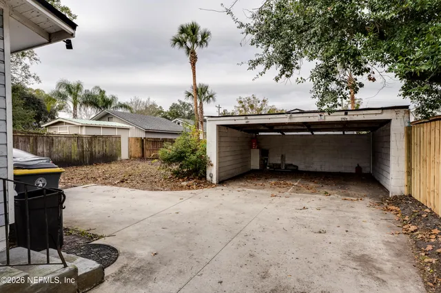 a view of a car in front of house
