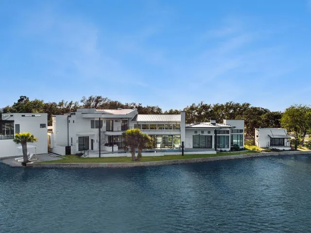 a view of a lake with building in front of it