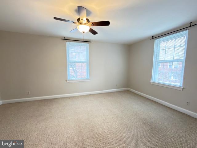 24 South Old Glebe Road, Unit 202 Arlington, VA 22204 - Photo 16 of 22 a view of an empty room with a window