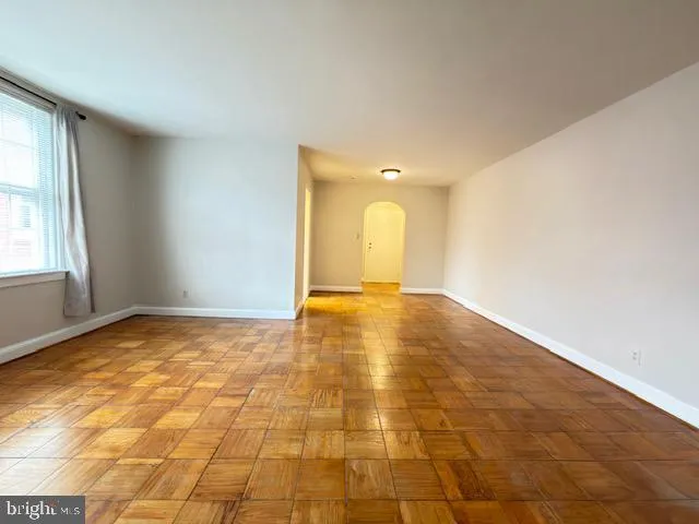 a view of an empty room and window