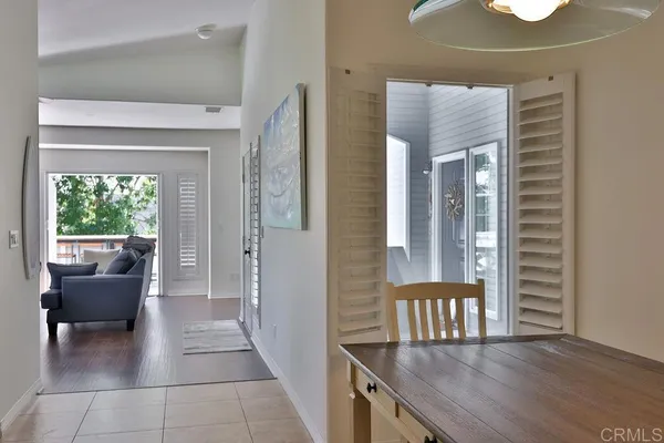 a kitchen with stainless steel appliances granite countertop a refrigerator and a stove