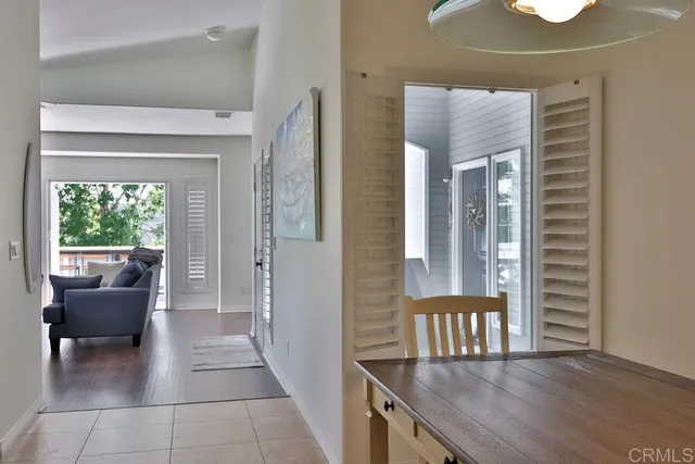 a kitchen with stainless steel appliances granite countertop a refrigerator and a stove