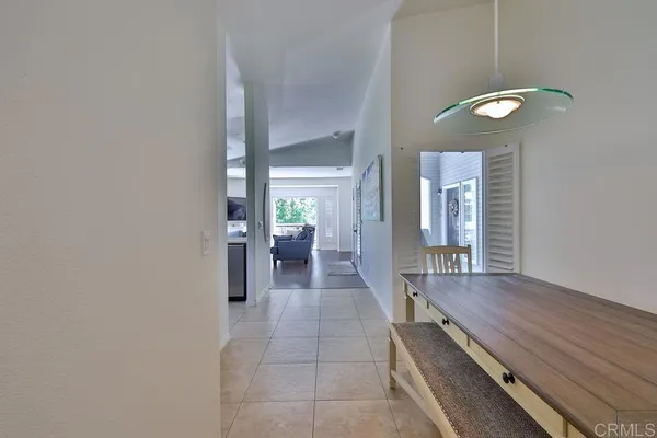 a kitchen with stainless steel appliances granite countertop a refrigerator stove a sink and dishwasher