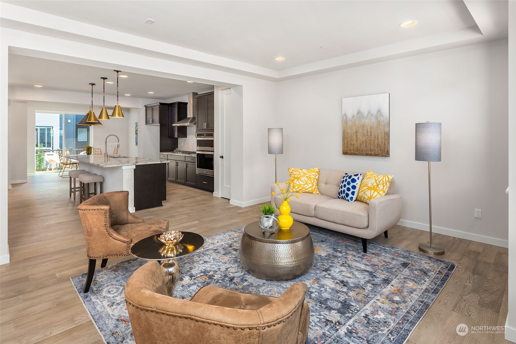616 237th Place Southeast, Unit E Bothell, WA 98021 - Photo 12 of 27 a living room with furniture and a table
