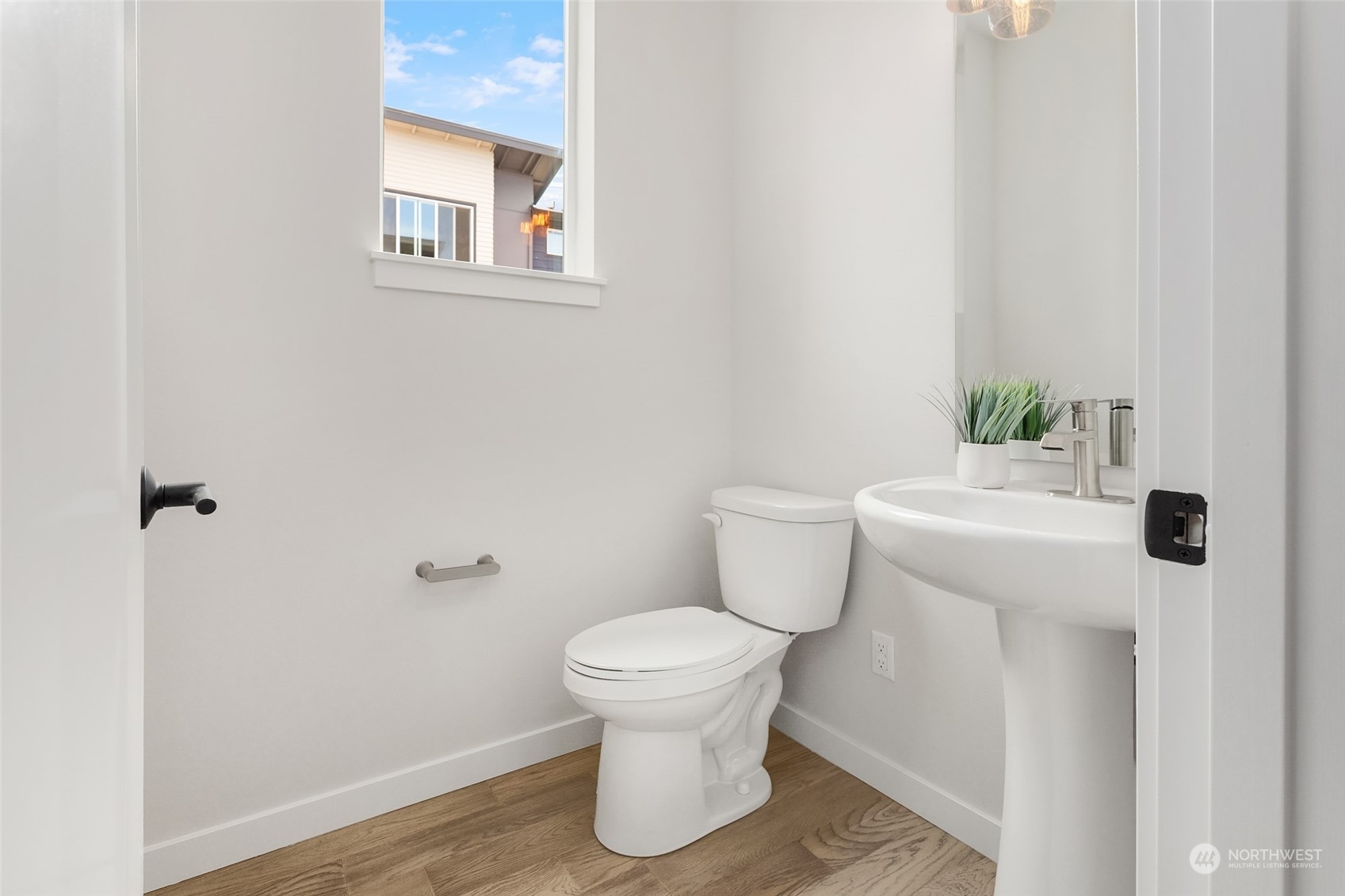 616 237th Place Southeast, Unit E Bothell, WA 98021 - Photo 13 of 27 a bathroom with a toilet and a sink