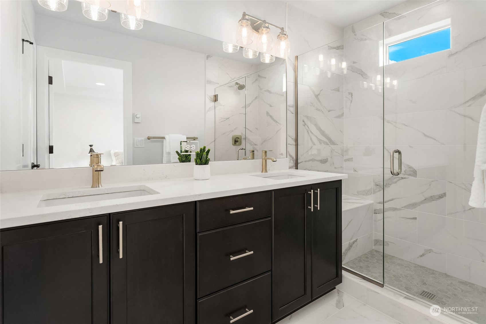 616 237th Place Southeast, Unit E Bothell, WA 98021 - Photo 20 of 27 a bathroom with a sink double vanity and a mirror