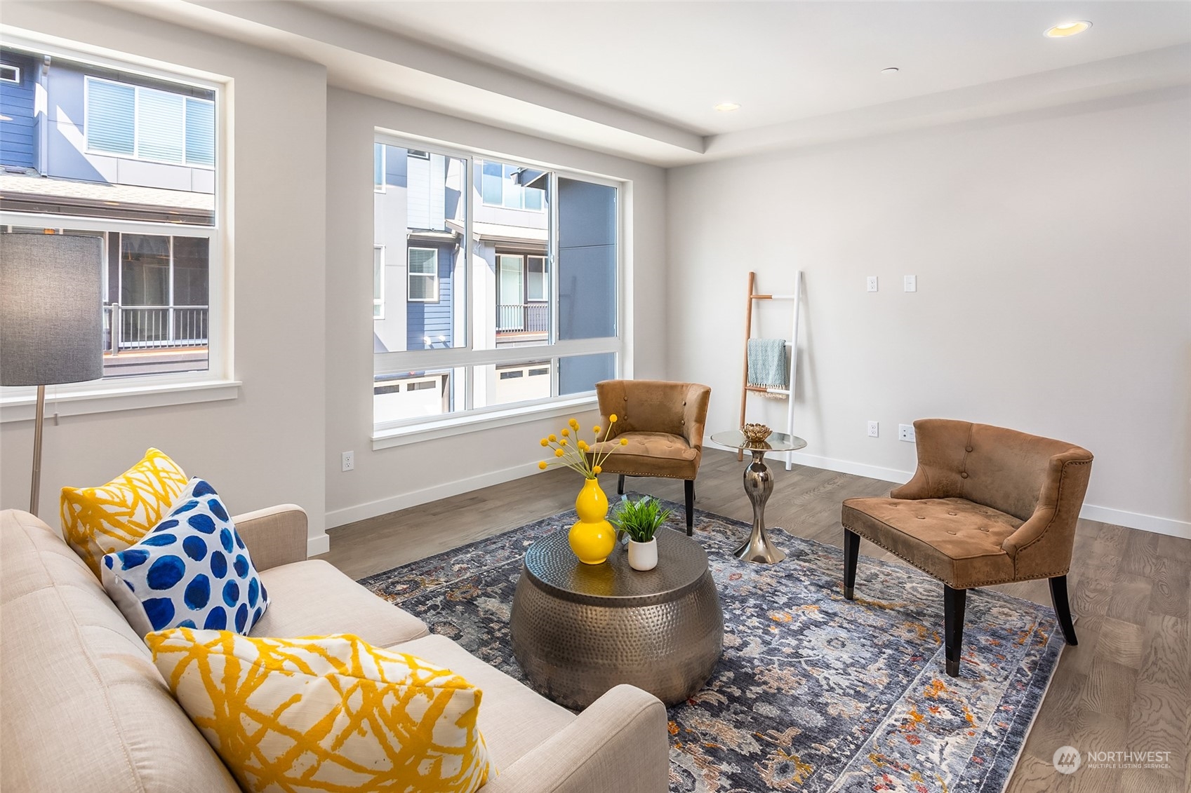 616 237th Place Southeast, Unit E Bothell, WA 98021 - Photo 24 of 27 a living room with furniture and a window