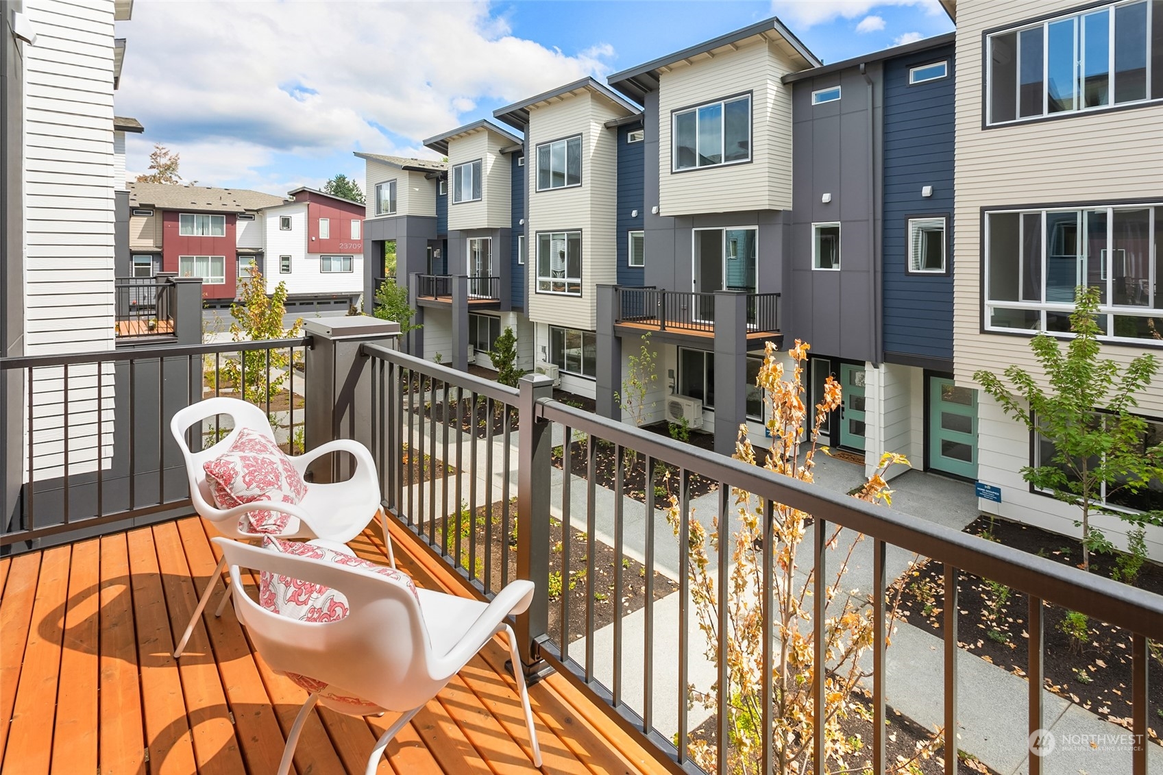 616 237th Place Southeast, Unit E Bothell, WA 98021 - Photo 10 of 27 a view of a chairs on the roof deck
