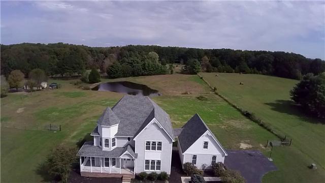1250 Carter Blake Road Tullahoma, TN 37388 - Photo 2 of 20 The home sits back off the paved road for privacy. This home has had recent renovations to include new windows, all of house painted, new carpet, new vinyl & front porch rails replaced.