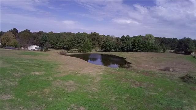 1250 Carter Blake Road Tullahoma, TN 37388 - Photo 4 of 20 The pond is situated on the back of the 4.76 acres. Nice views of the pond from the home...