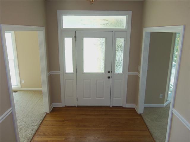1250 Carter Blake Road Tullahoma, TN 37388 - Photo 6 of 20 The front entry foyer features wood floors and a beautiful front door. The dining room is off to the right and the living room is to the left from entry...