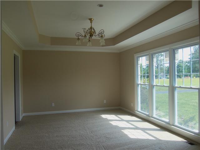 1250 Carter Blake Road Tullahoma, TN 37388 - Photo 8 of 20 The beautiful formal dining room is 17x12 featuring new paint, new carpet, new windows (thru-out home) and trey ceiling. Enjoy the lighting in this room from the triple window...