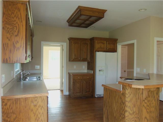 1250 Carter Blake Road Tullahoma, TN 37388 - Photo 10 of 20 The kitchen area also features a pantry located between the dining room and the kitchen area. Two closets, one on left and one on right. The one on the right has a water filter in pantry. (water filter does not work)