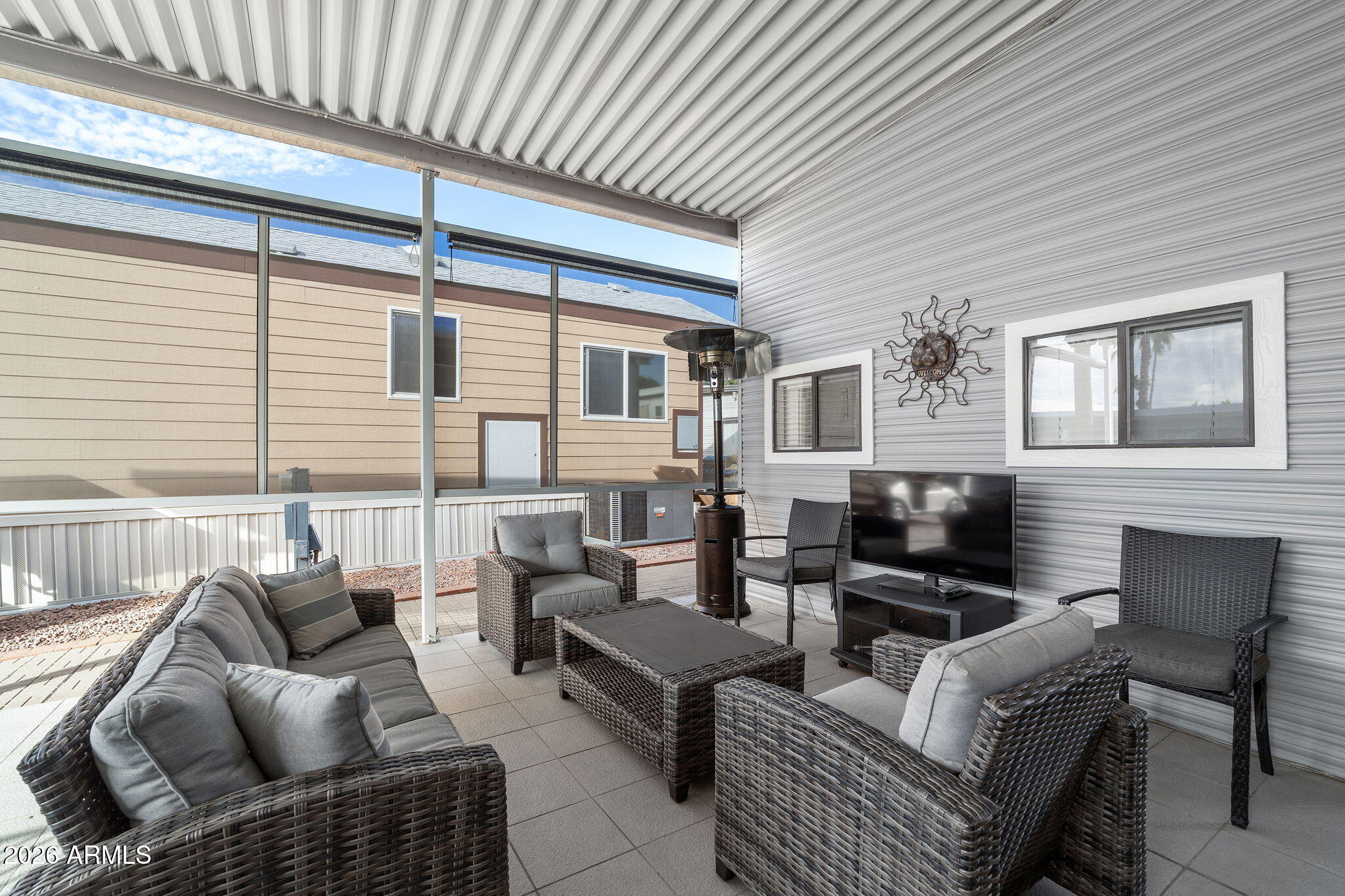 111 South Greenfield Road, Unit 527 Mesa, AZ 85206 - Photo 3 of 15 a outdoor living space with furniture