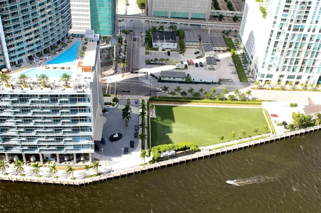a view of swimming pool with a yard