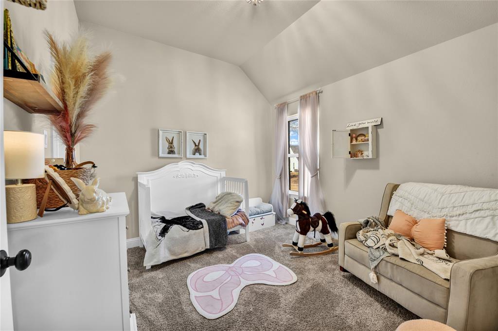 2044 Redemption Drive Weatherford, TX 76088 - Photo 12 of 30 a living room with furniture and a lamp