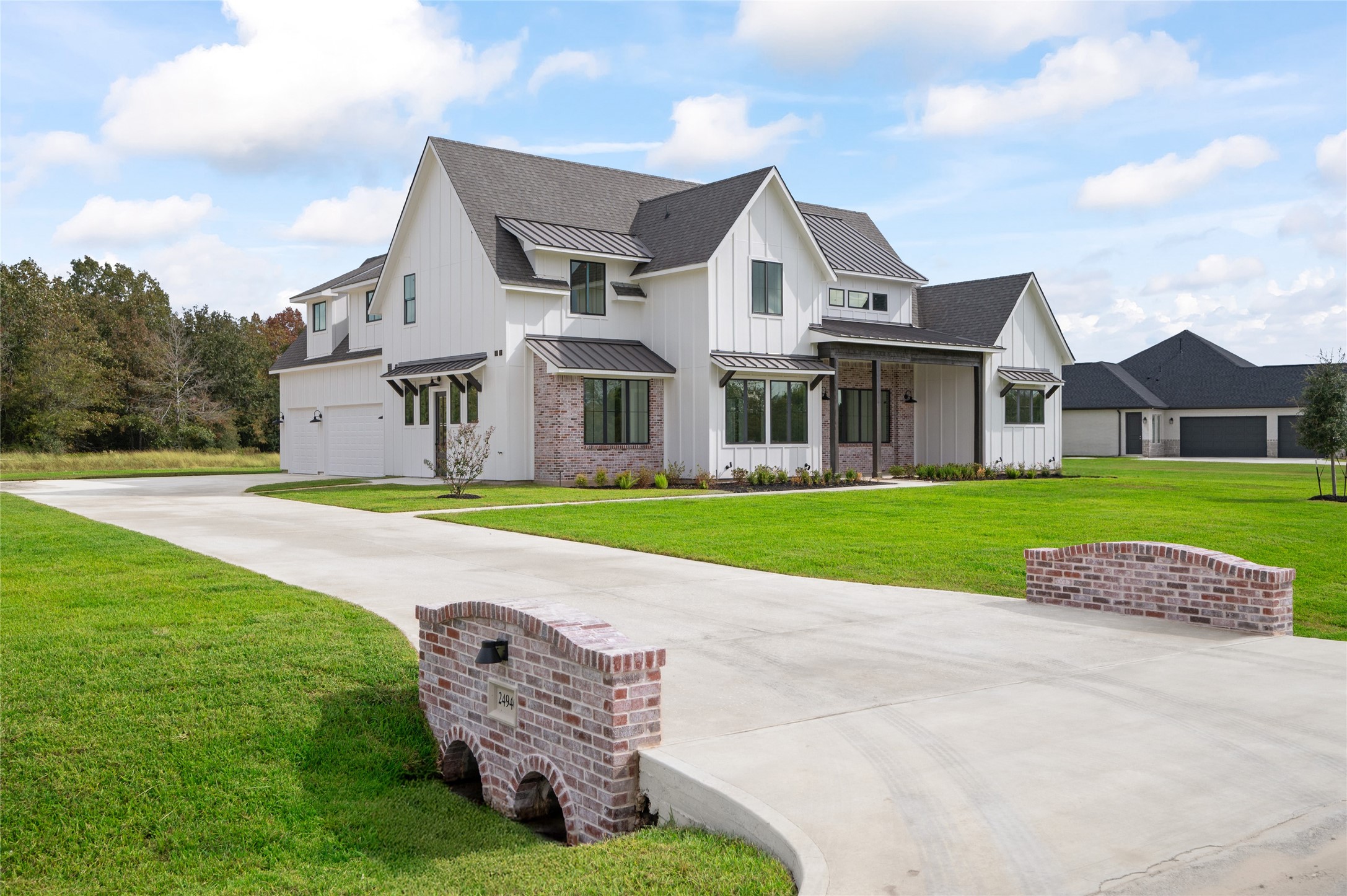 24940 Hopeview Way Montgomery, TX 77356 - Photo 2 of 49 a view of building with garden