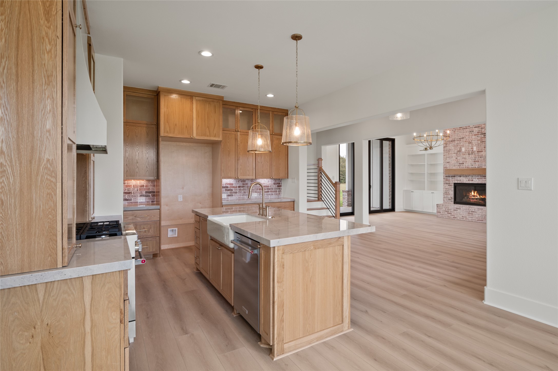 24940 Hopeview Way Montgomery, TX 77356 - Photo 21 of 49 a kitchen with stainless steel appliances granite countertop a stove and a refrigerator