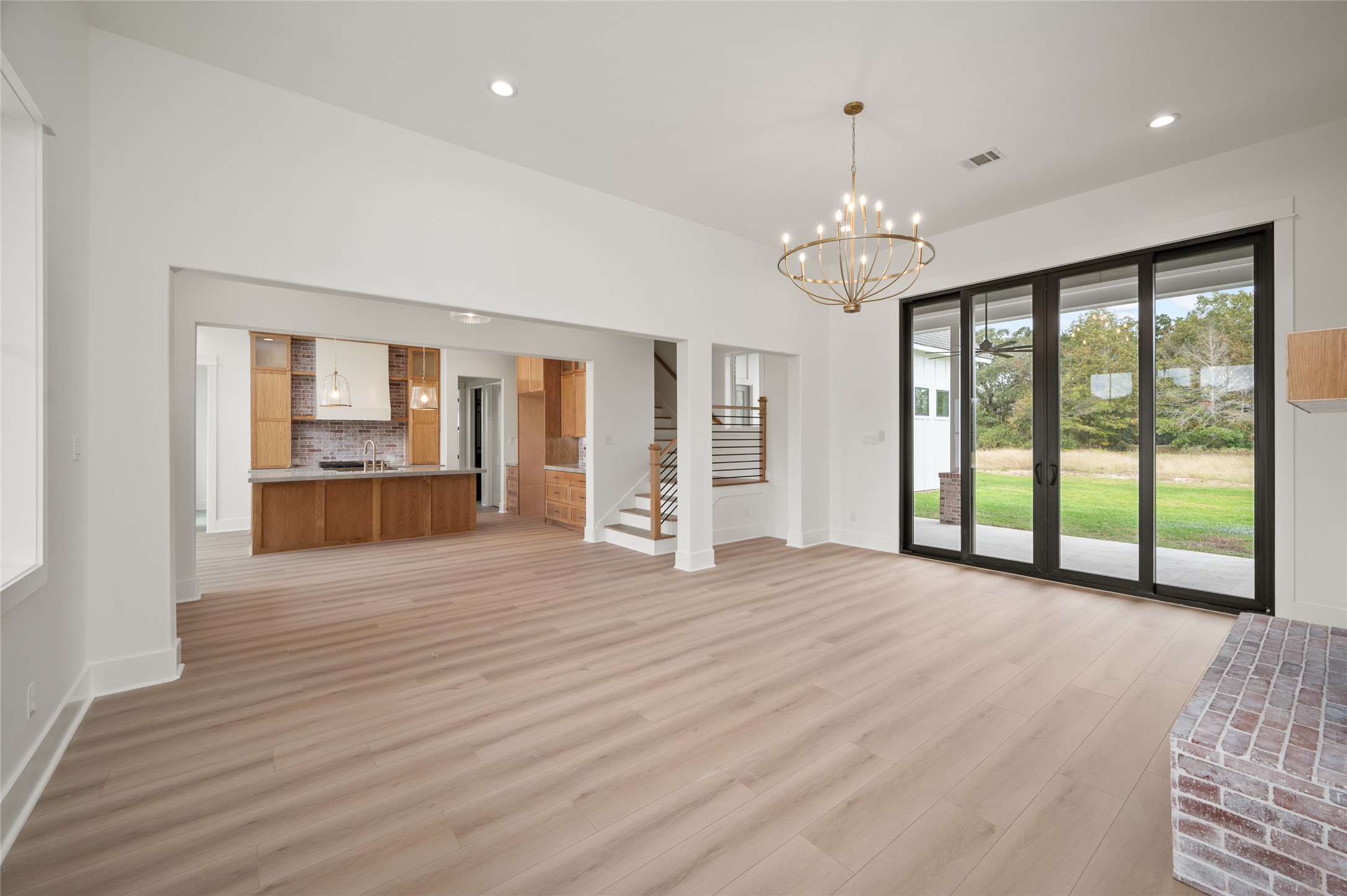 24940 Hopeview Way Montgomery, TX 77356 - Photo 33 of 49 a view of an empty room with a window and wooden floor