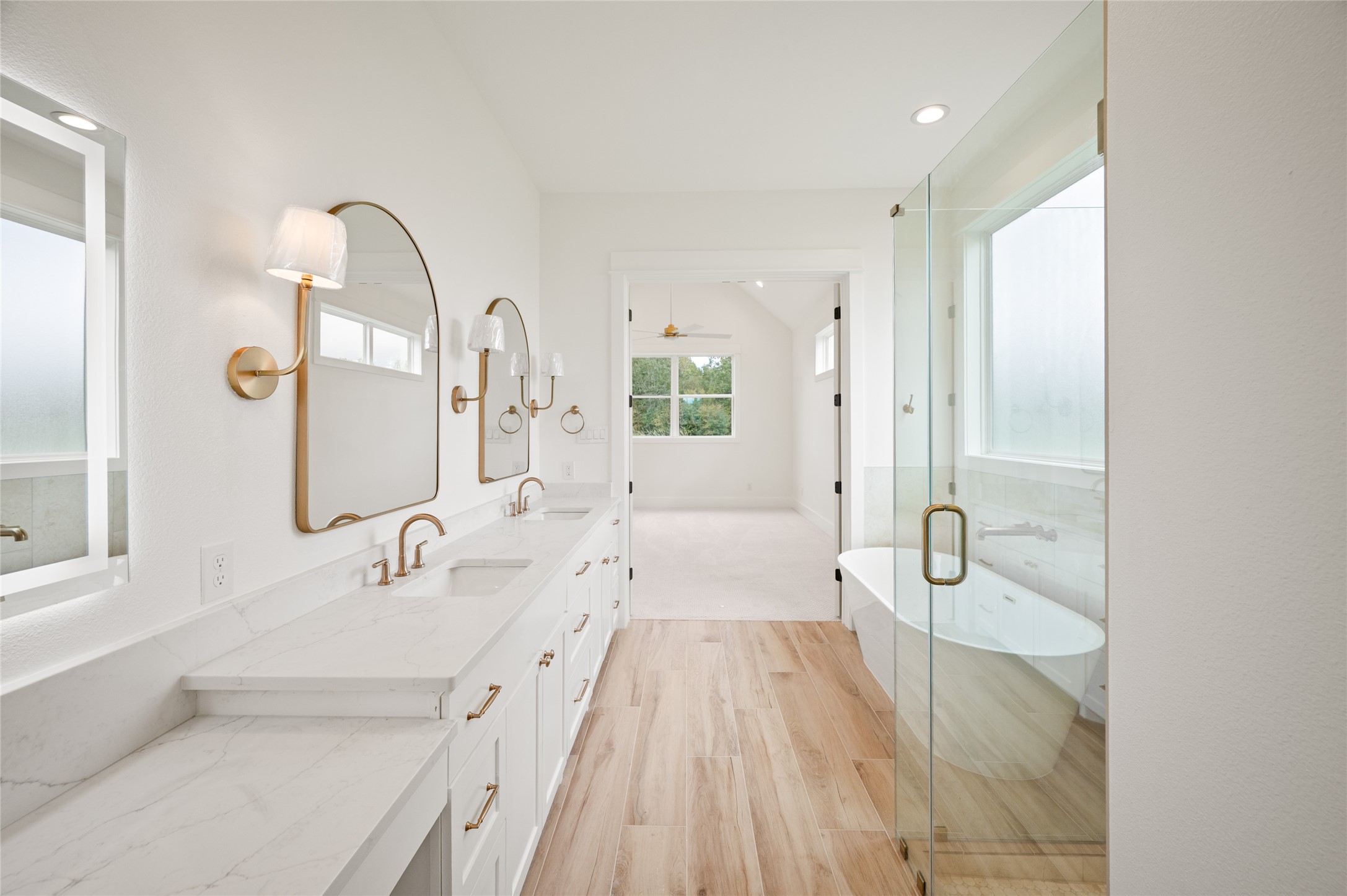 24940 Hopeview Way Montgomery, TX 77356 - Photo 39 of 49 a spacious bathroom with a tub sink and mirror