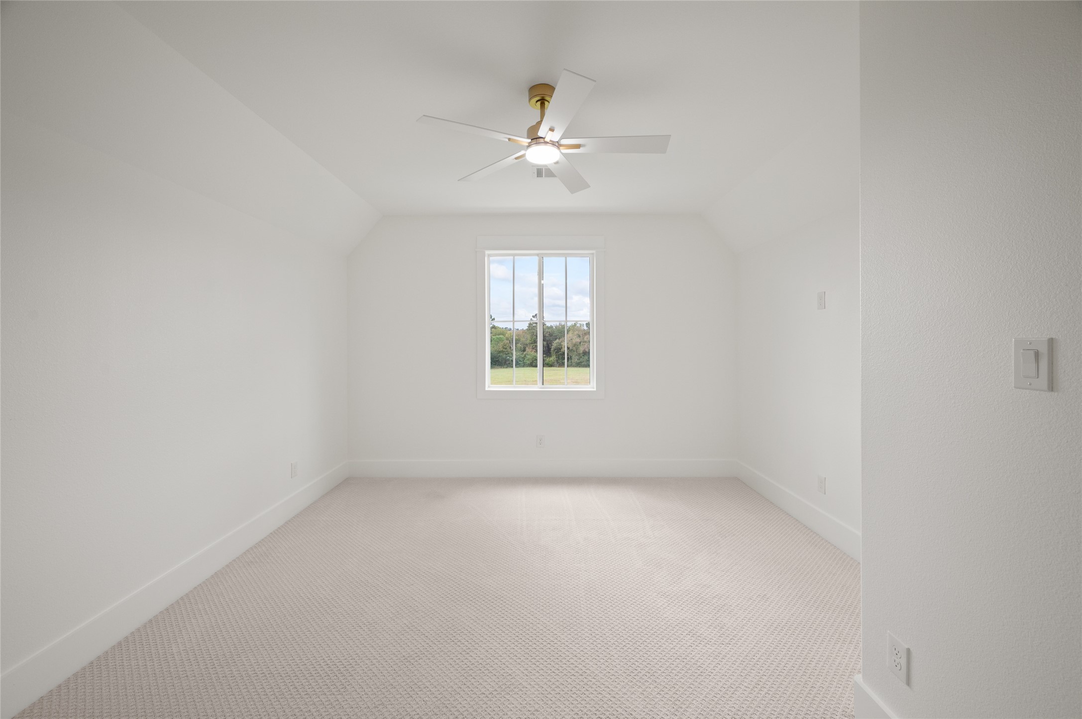 24940 Hopeview Way Montgomery, TX 77356 - Photo 41 of 49 an empty room with window and ceiling fan