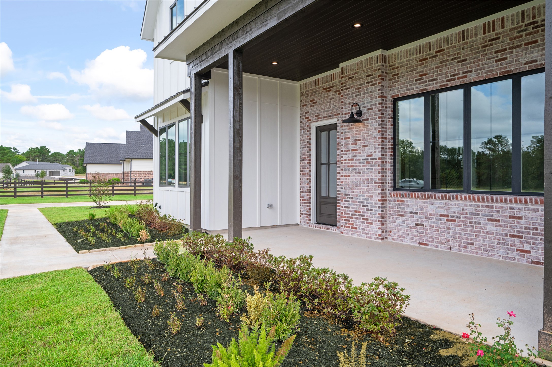 24940 Hopeview Way Montgomery, TX 77356 - Photo 9 of 49 a front view of a house with a yard