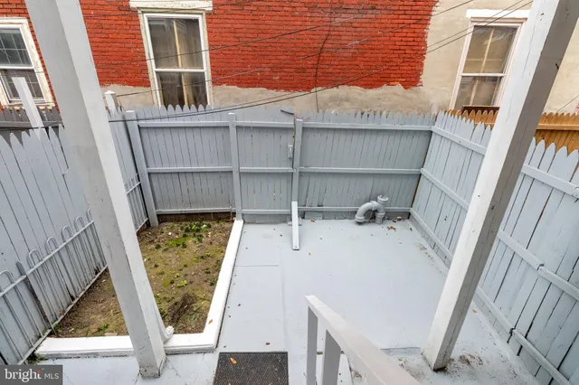 a picture of a bathroom with mirror
