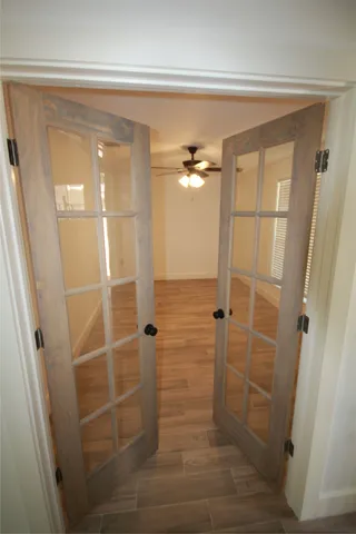 a bathroom with a glass door shower